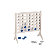 A white Ledge Lounger Four In A Row game stands upright, featuring several blue and gray checkers inside and a few checkers scattered on the ground nearby.
