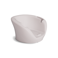 Soft beige plastic baby bathtub with curved backrest, leg support, and side cutout handles, inspired by the Ledge Lounger Autograph Chaise Armrest Console—perfect for a relaxing bath time.