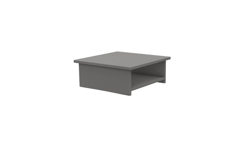 Introducing the Echo Side Table by Ledge Lounger – a sleek, modern gray pedestal with a minimalist rectangular design. Ideal for patio essentials, it boasts a flat top and an open shelf below, showcased elegantly against a plain white backdrop.