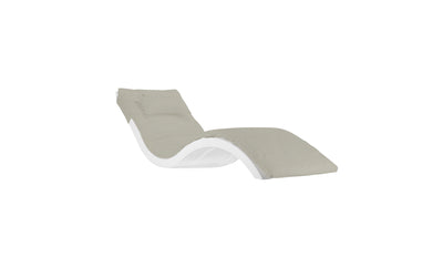The Signature Chaise Cushion by Ledge Lounger is a modern, curved white lounge with a light gray cushioned seat and backrest, set on a white background. Final Sale.