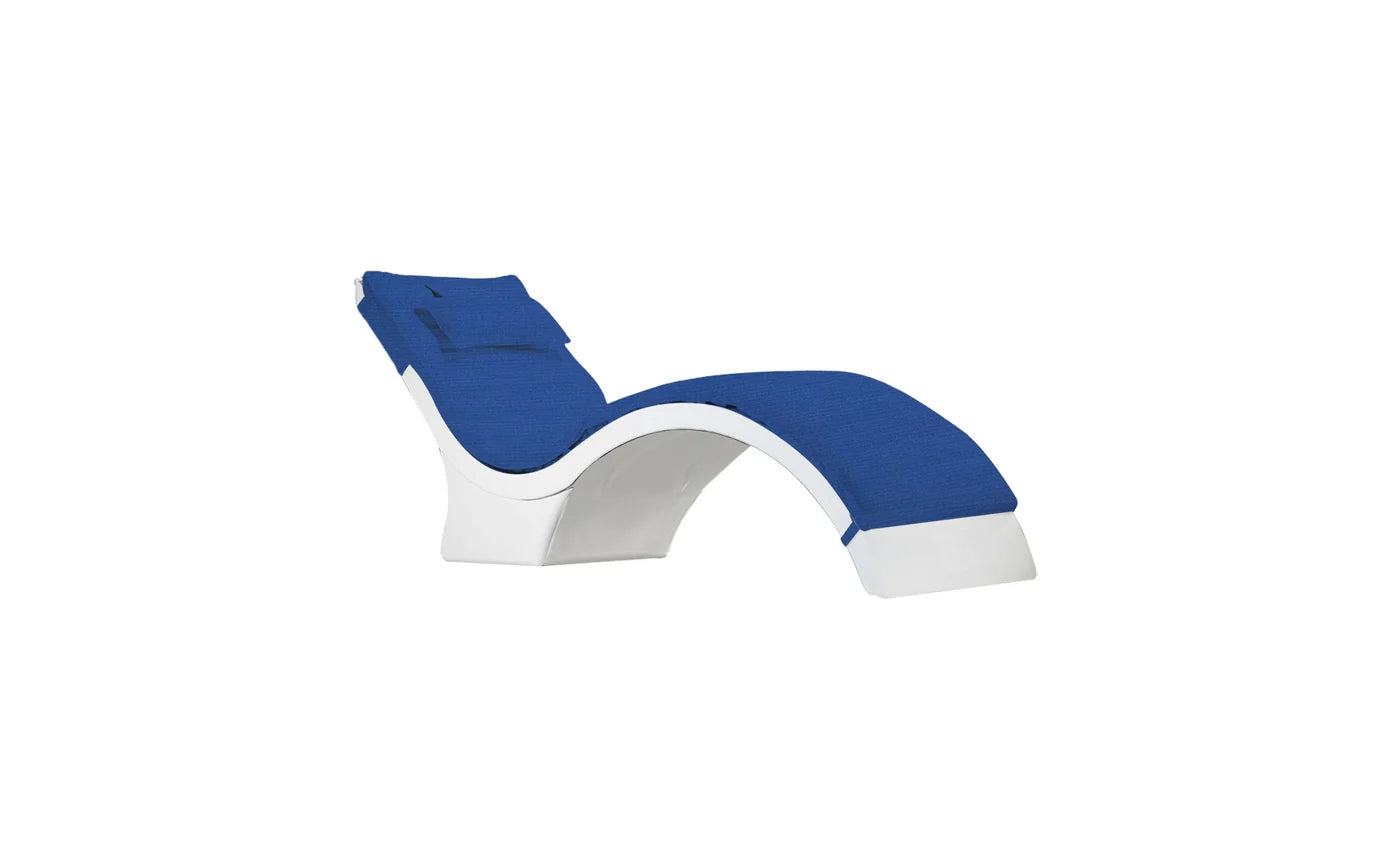 The Ledge Lounger Signature Chaise Deep Cushion features a modern white and blue curved design with a blue lounge cushion and matching headrest, ideal for stylish poolside relaxation.