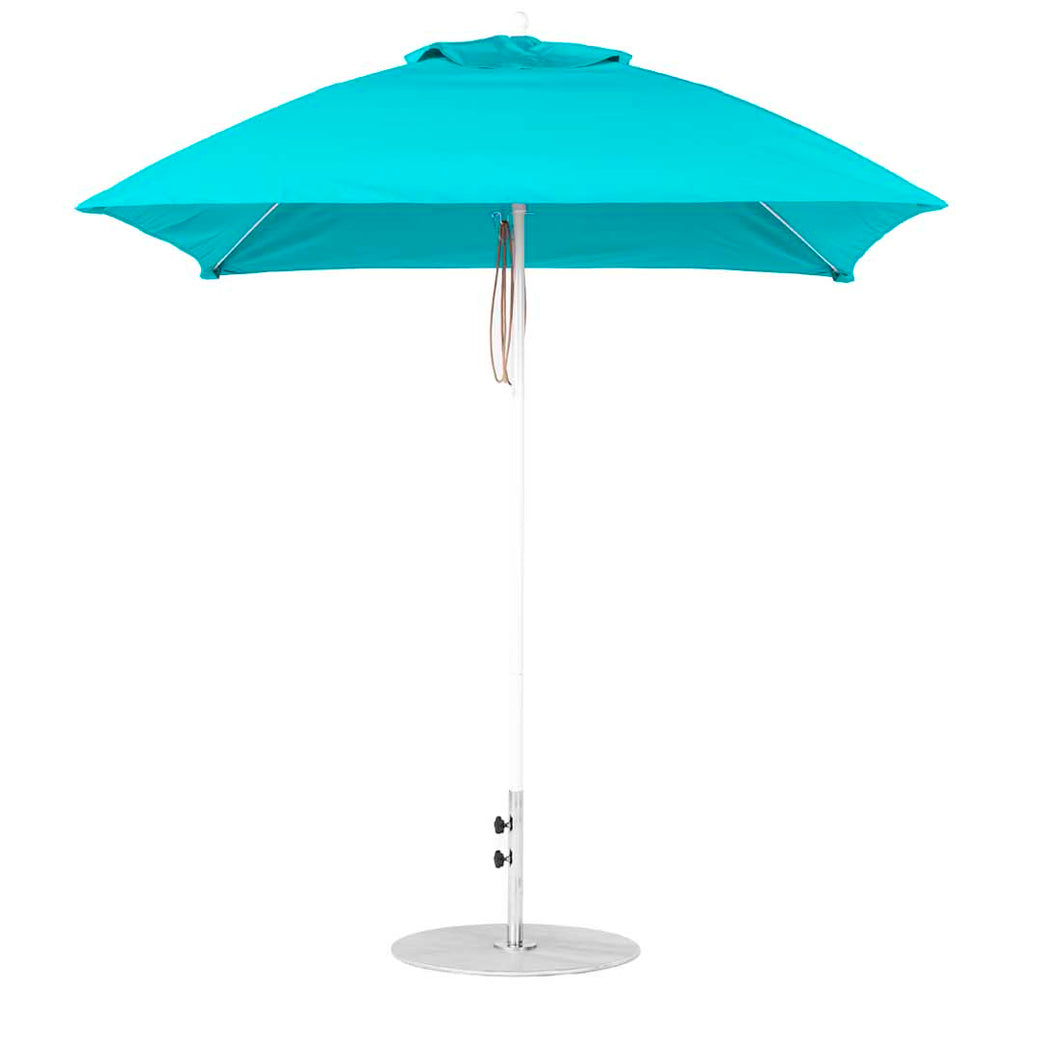 The 7.5 Square Pulley Essential Fiberglass Umbrella by Ledge Lounger boasts a turquoise, open canopy of marine-grade fabric, a silver pole with a round base, and adjustable height for versatile in-pool and on-deck use.