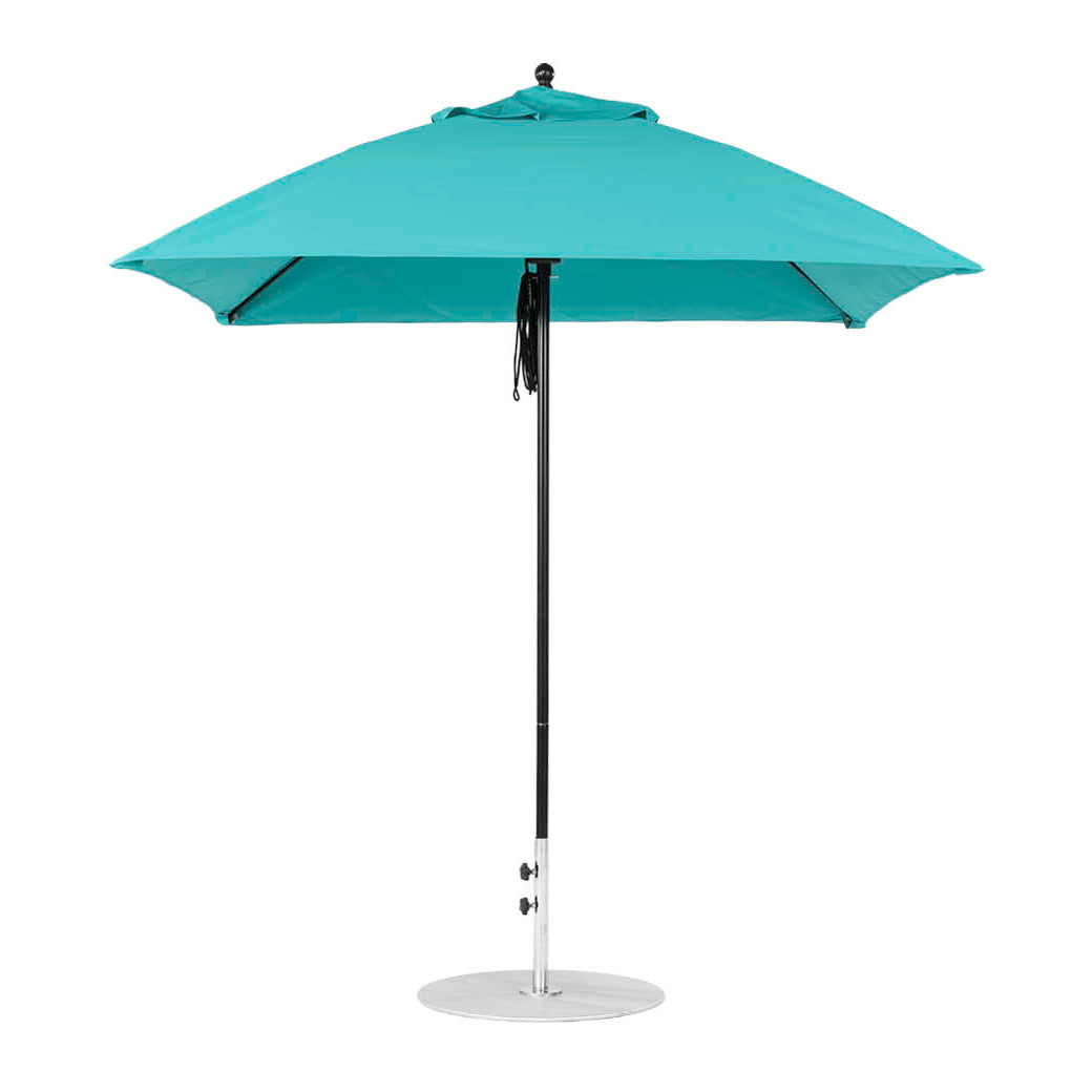 The Ledge Lounger Essential Fiberglass Umbrella features a 7.5 square canopy in turquoise with a metal base and straight pole. Its open design reveals an eight-rib support structure, crafted with marine-grade fabrics for ultimate durability.