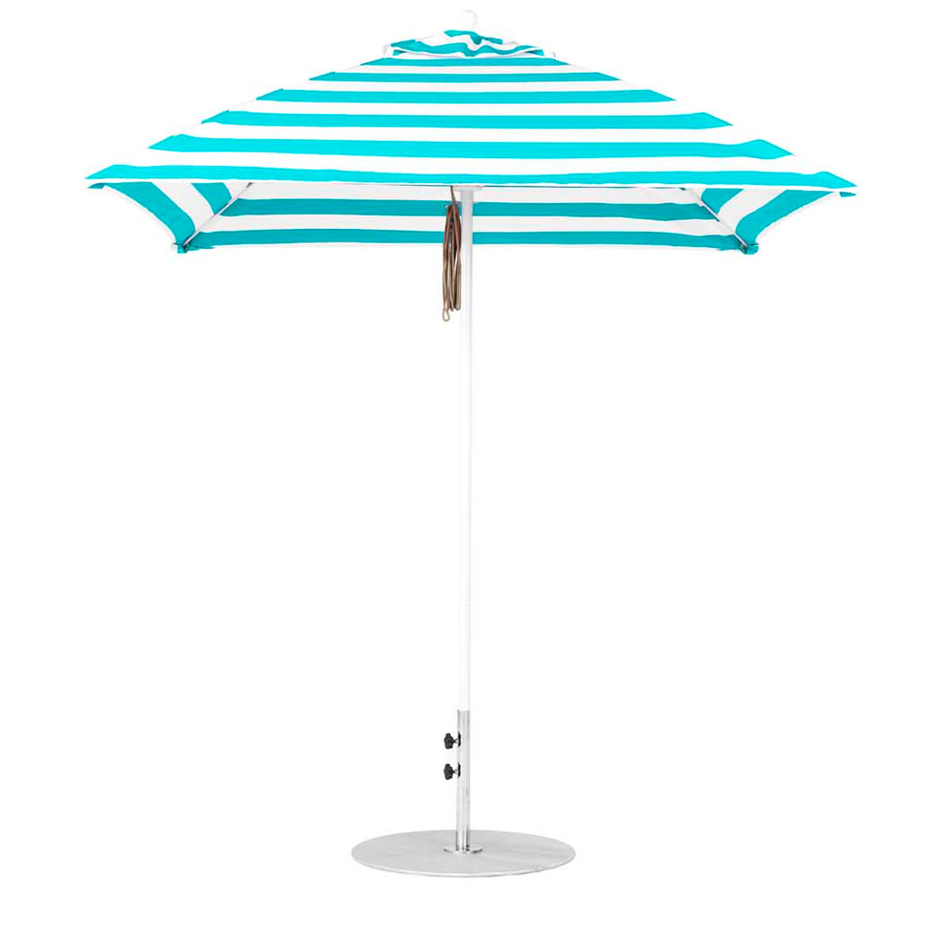 The Ledge Lounger Essential Fiberglass Umbrella features a blue and white stripe, marine-grade fabric, a pointed top with a straight metal pole, and stands securely on a round metallic base.