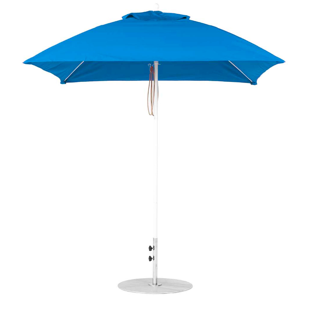The Ledge Lounger Essential Fiberglass Umbrella features a sleek metal pole, round base, and durable marine-grade fabrics. This blue 7.5 square pulley design is simple yet elegant, providing ample shade for gardens or patios.