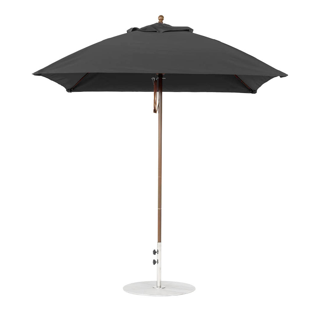 The Ledge Lounger Essential Fiberglass Umbrella - 7.5 Square Pulley stands upright with a sleek, modern design, featuring a durable open canopy crafted from marine-grade fabrics.