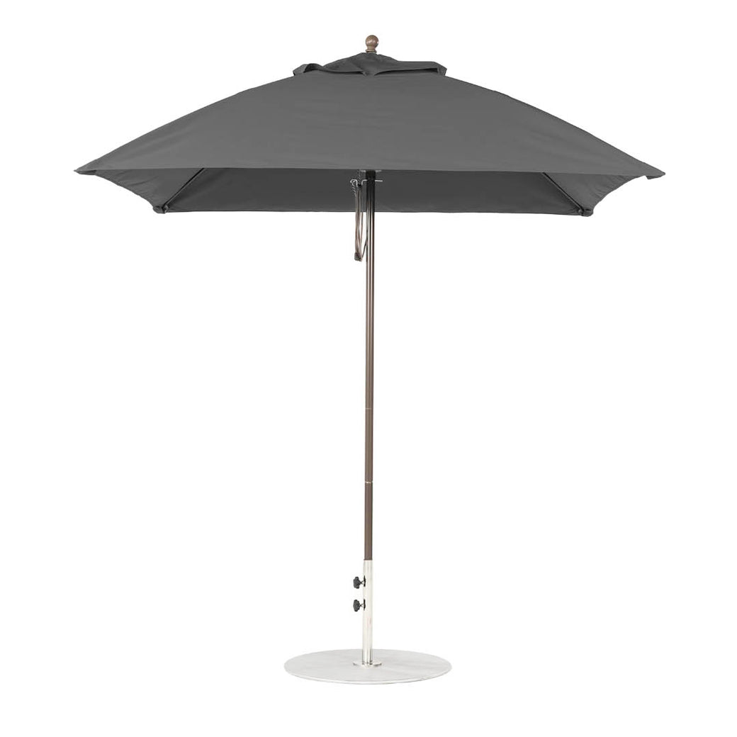 The Ledge Lounger Essential Fiberglass Umbrella - 7.5 Square Pulley is a gray outdoor umbrella featuring a sleek metal pole, smooth circular base, and a round canopy made from marine-grade fabrics, ensuring durability and style against its plain white background.