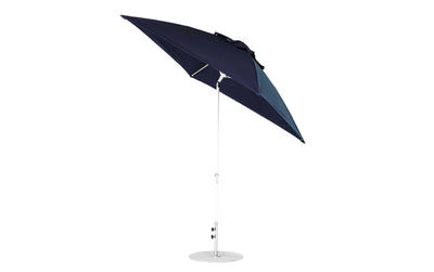 The Ledge Lounger Essential Fiberglass Umbrella - 7.5 Square Crank Auto Tilt features a dark blue canopy with a metal pole and round base. Its marine-grade fabrics offer corrosion resistance, ensuring durability while providing ample outdoor shade.