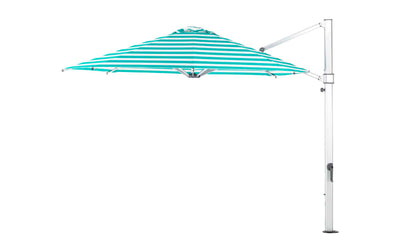The Ultra Cantilever Umbrella by Ledge Lounger, an 11 octagon with a green and white stripe design, includes a rechargeable outdoor light. Supported by a tall light-colored metal pole with a hand crank, it’s perfect for enhancing your patio day or night.