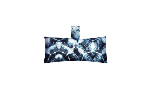 The Autograph Headrest Pillow by Ledge Lounger is a rectangular pillow featuring a blue and white tie-dye pattern with a matching fabric handle, ideal for in-pool relaxation.