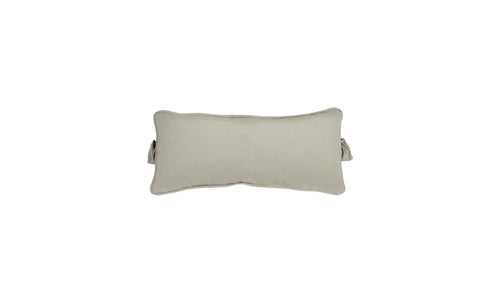 The Signature Headrest Pillow by Ledge Lounger is a rectangular, light beige pillow with a subtle sheen and slightly wrinkled texture, perfect for relaxation in the pool. It has thin, flat edges and is set on a plain white background.