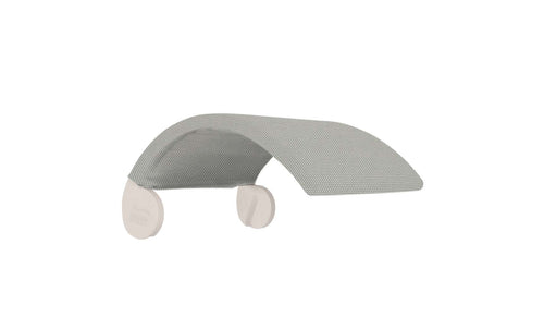 A heather gray cap with a curved brim and white circles mirrors the modern look of Ledge Loungers Signature Chair Shade. Its versatile design suits any setting, akin to relaxing on a pool tanning ledge with a simple white backdrop.