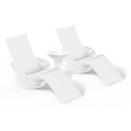 The Ledge Lounger Autograph Chaise Island Lounge Set features two modern white chaise chairs with curved seats and built-in leg rests, set side by side with a small circular white table, all on a plain white background.