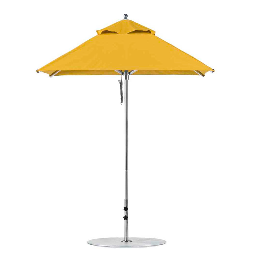The Premier Aluminum Umbrella - 6.5 Square Pulley by Ledge Lounger features a yellow canopy with marine-grade fabrics, a silver pole, and a round base, standing against a plain white background.