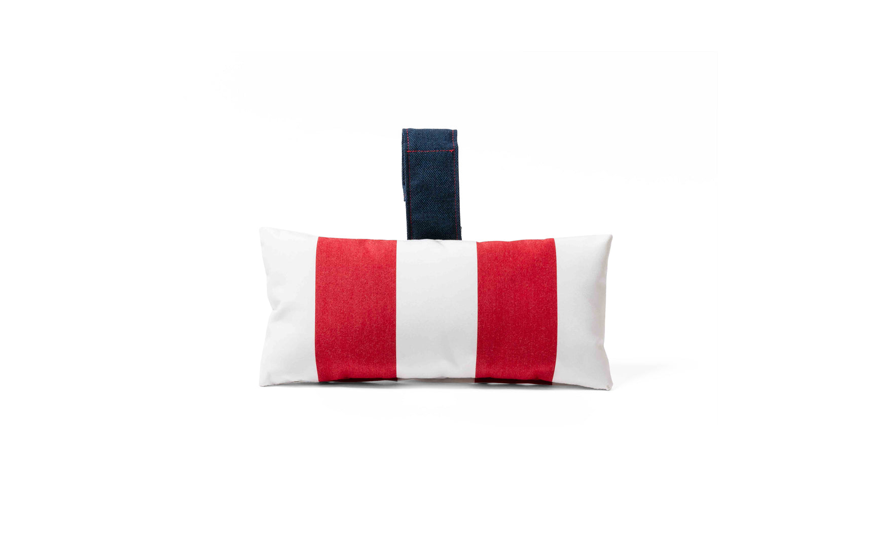 The Autograph Headrest Pillow by Ledge Lounger features red and white vertical stripes with a dark blue handle. Made from marine-grade fabric, its ideal for in-pool relaxation against a plain white background.