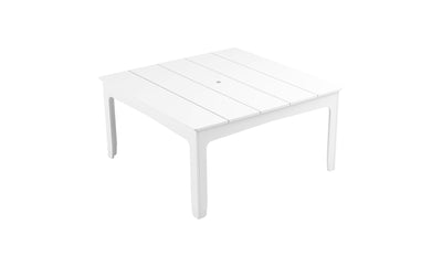 The Mainstay Square Dining Table by Ledge Lounger, featuring a white slatted top with a central hole and straight legs, is perfect for outdoor dining. Its minimalist design includes an umbrella sleeve, exuding simplicity and functionality against a plain white background.