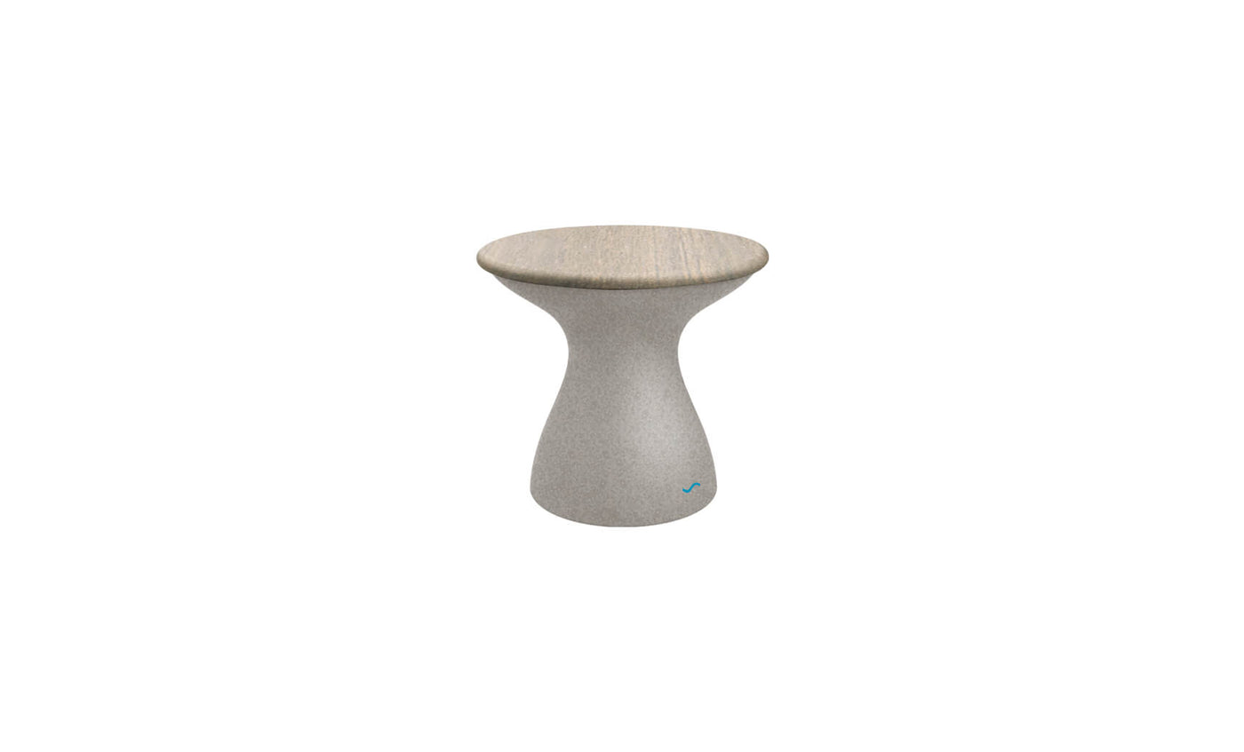 The Autograph Standard Side Table by Ledge Lounger features a modern hourglass design with a smooth light gray concrete finish and rounded top, ideal for contemporary interiors or as a chic outdoor side table by the pool.