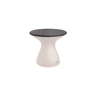 The Autograph Standard Side Table by Ledge Lounger is a modern outdoor side table with an hourglass shape, sleek gray top, and smooth white base. The base includes a subtle blue logo near the bottom, making it perfect for poolside storage or any stylish setting.