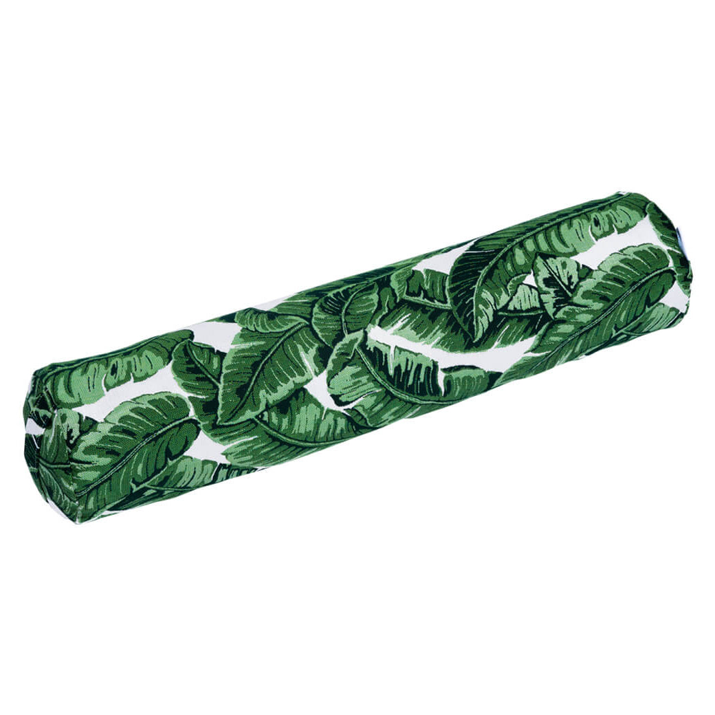 The Laze Doodle by Ledge Lounger is a cylindrical bolster pillow with a lush green leaf pattern on white, featuring overlapping large tropical leaves for a fresh, vibrant look.