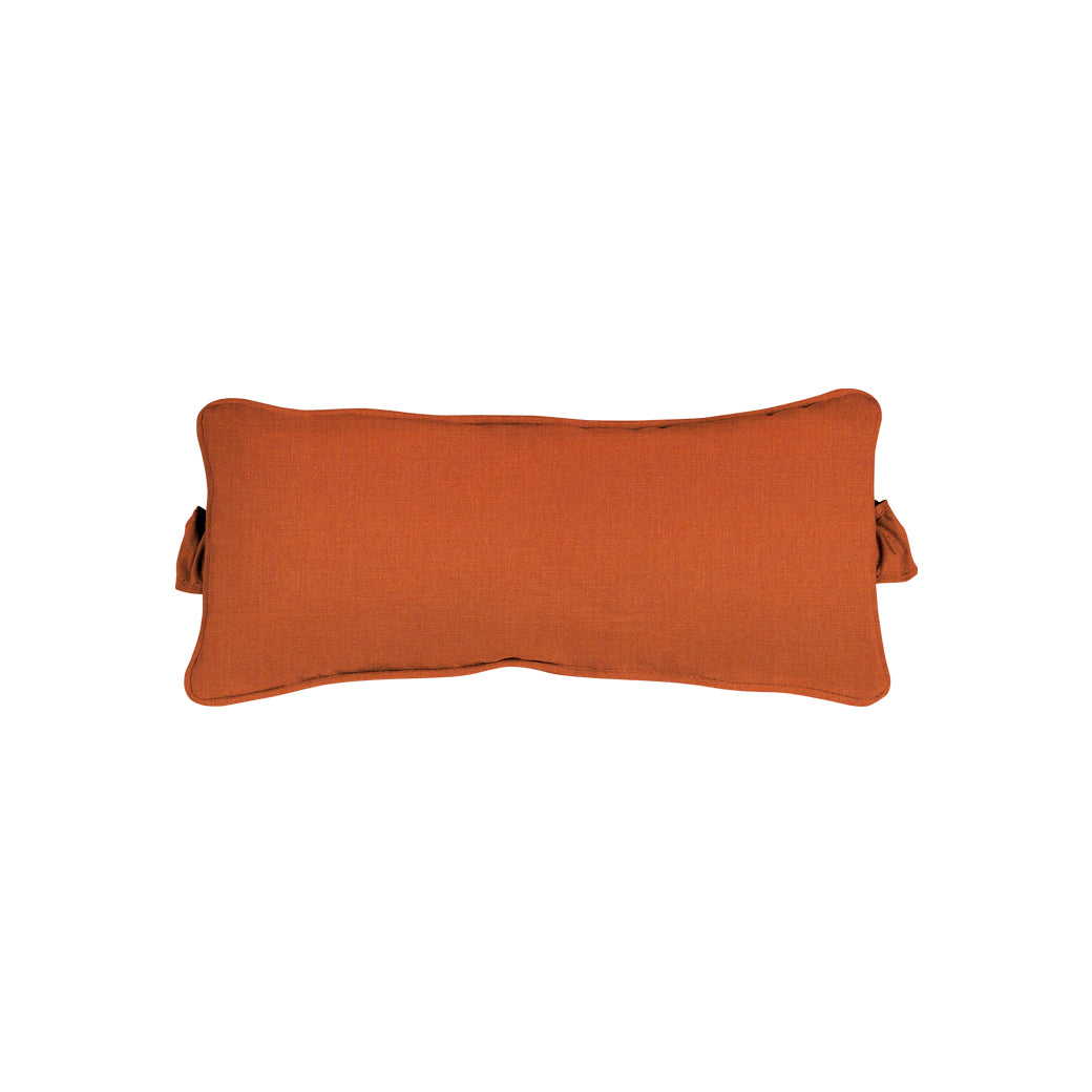 The Signature Headrest Pillow by Ledge Lounger is orange, rectangular, with a textured fabric surface and wavy edges. It features small side loops for hanging or decoration and is displayed centered on a white background. Note: This item is final sale.