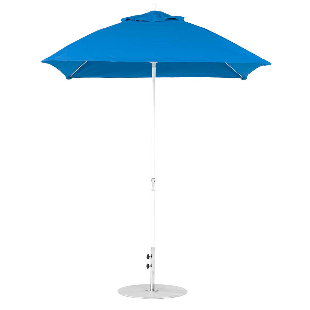 A fully open, blue 7.5 square crank beach umbrella from Ledge Lounger with a white pole and round base, designed for sun protection.