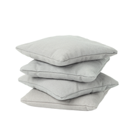 Four light gray square bean bags from Ledge Lounger are stacked against a white background.