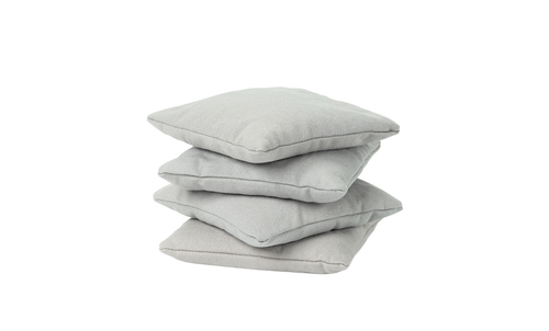Four light gray square bean bags from Ledge Lounger are stacked against a white background.
