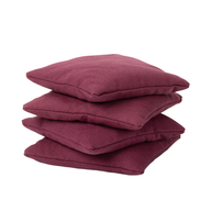 The Ledge Lounger Bean Bags Set of Four features square, maroon, durable fabric pillows—ideal as outdoor bean bags for your cornhole set and displayed neatly on a white background.