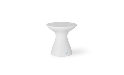 The Autograph Tall Ice Bin Side Table by Ledge Lounger is a sleek, modern outdoor table featuring a flared base and round top. Its minimalist design includes a subtle blue logo near the base, set against a plain white background, perfect for enhancing any contemporary patio décor.