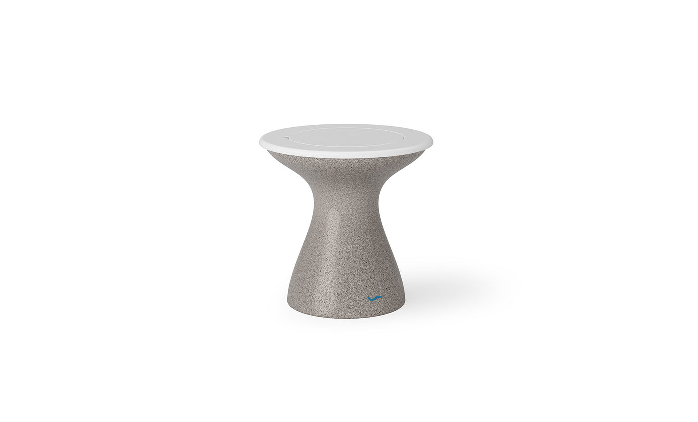 The Autograph Tall Ice Bin Side Table by Ledge Lounger is a modern, hourglass-shaped stool with a textured gray body and smooth white circular seat, ideal as an outdoor side table against a plain white background.