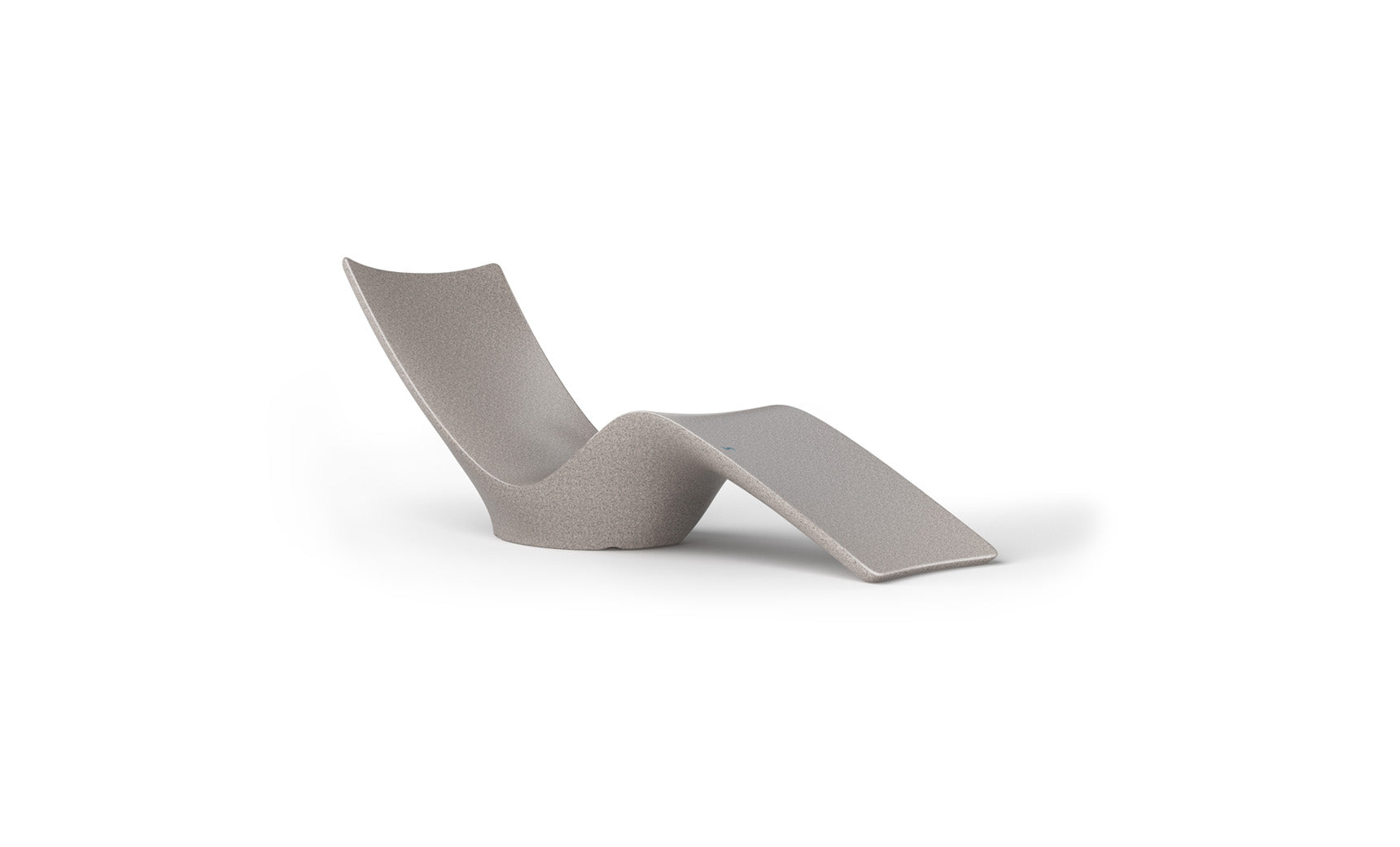 The Ledge Lounger Autograph Chaise is a modern, minimalist gray lounge chair with a seamless, curvy design that extends into a leg rest, ideal for enhancing outdoor relaxation. The plain white background accentuates its unique structure.