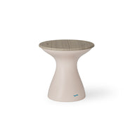 The Autograph Tall Ice Bin Side Table by Ledge Lounger features a modern, hourglass design with a beige body and textured wooden top. A small blue wave logo adorns the base, making it versatile for any setting, from a white background to seamlessly blending into your patio decor.