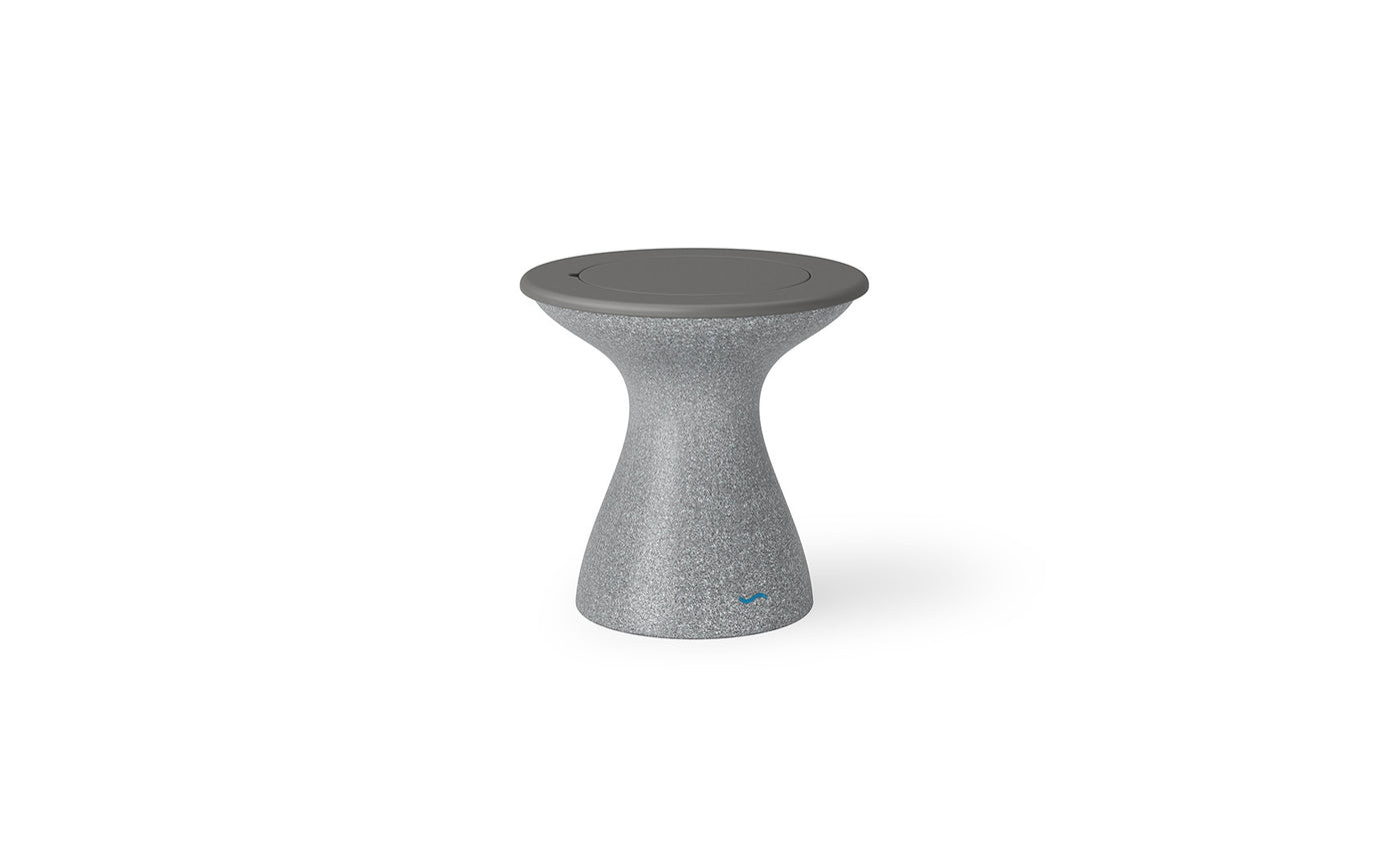 The Autograph Tall Ice Bin Side Table by Ledge Lounger is a sleek gray stool with an hourglass shape and smooth rounded top, doubling as a versatile outdoor side table. Its wider base ensures stability, while the textured surface adds contemporary flair to any setting.