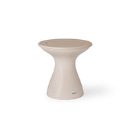 Ledge Loungers Autograph Tall Ice Bin Side Table is a versatile, hourglass-shaped stool with a smooth beige finish. It has a round seat, slightly wider base, and displays a small blue logo near the bottom for outdoor use.