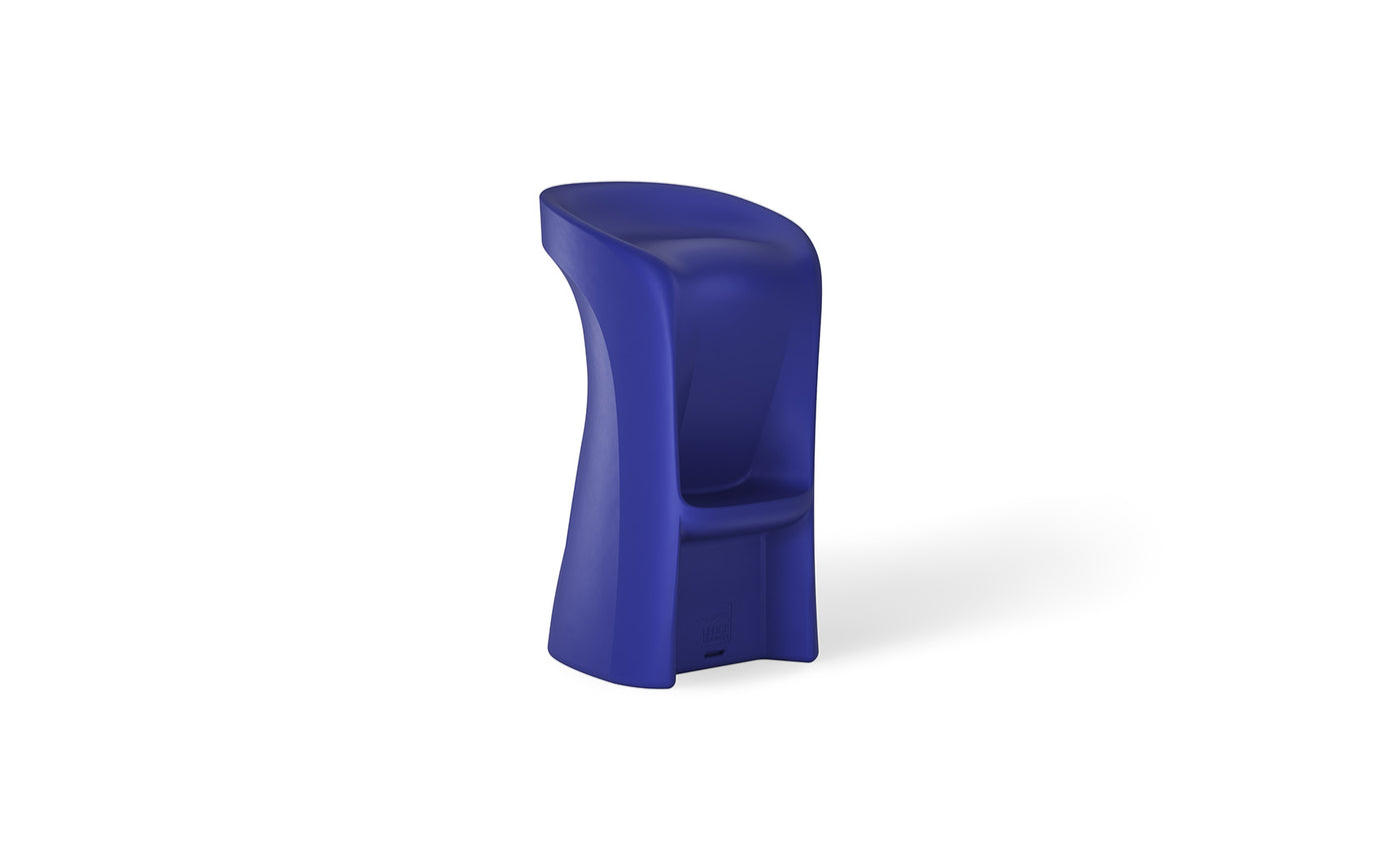 Introducing Ledge Loungers Signature Barstool Bar Height: a modern, sculptural piece in vibrant blue. Its smooth curved seat with back support and footrest enhances comfort, ideal for poolside seating. Crafted from a single material, it elevates outdoor entertaining against a plain white backdrop.