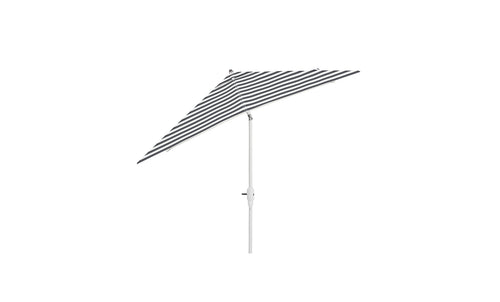 The 8.5 Square Signature 360° Tilt Umbrella by Ledge Lounger boasts a luxurious black and white striped canopy, offering elegance outdoors. Its crafted from premium materials and attached to a sleek white pole, creating a stunning contrast against its crisp white backdrop.