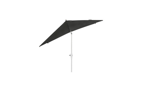 The 8.5 Square Signature 360° Tilt Umbrella by Ledge Lounger, featuring an angled dark green shade and white pole, is displayed against a plain white backdrop, embodying resort luxury.