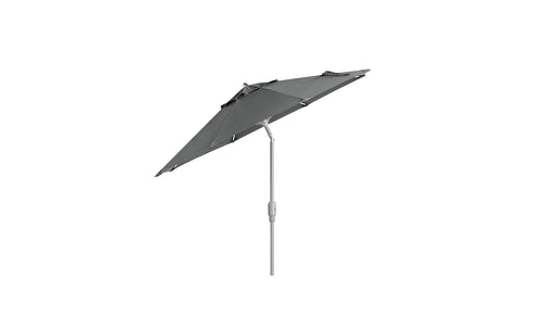 The Ledge Lounger 7.5 Octagon Signature 360° Tilt Umbrella, with a green canopy and slender gray pole, epitomizes outdoor elegance. Crafted from premium materials, its fabric cover is supported by metal ribs against a plain white background.