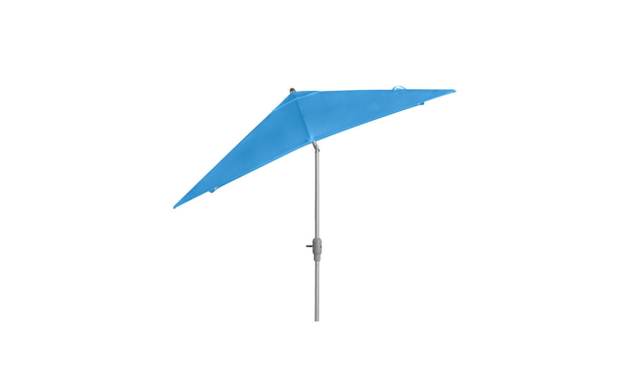 The 8.5 Square Signature 360° Tilt Umbrella by Ledge Lounger features a minimalist design with a sleek adjustable stand, crafted from premium materials, embodying outdoor elegance against a crisp white background.