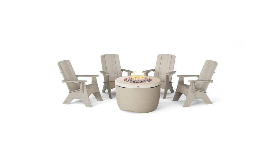The Halo Aglow Bundle from Ledge Lounger features four beige Adirondack chairs arranged around a circular fire pit table with a smooth stone surface and decorative stones around the central flame, all set against a plain white background.