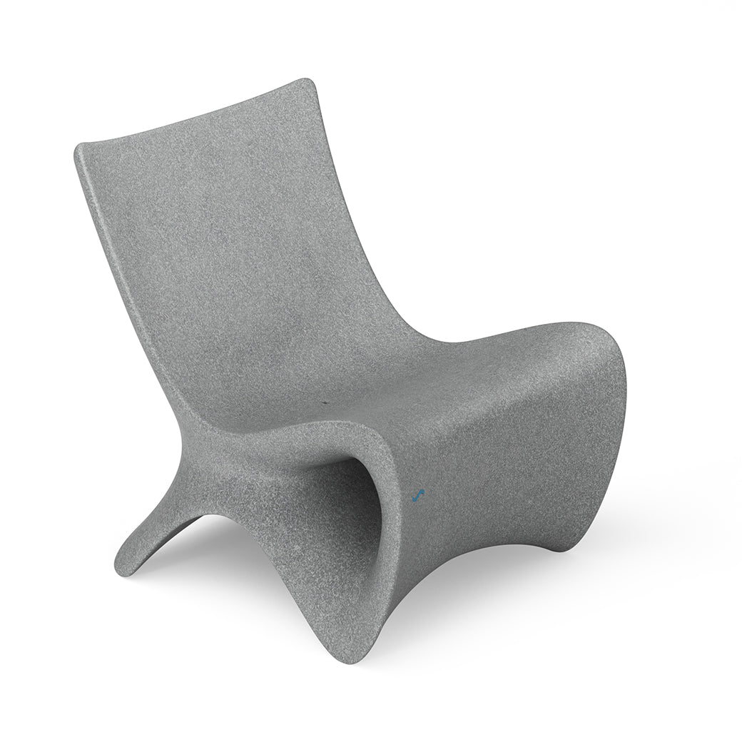 The Autograph Chair by Ledge Lounger features a sleek, modern design with elevated ergonomics and a minimalist curved style in gray, shown against a plain white background.