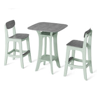 The Haven Hightop Set by Ledge Lounger includes a small dining table with a square dark wood tabletop and mint green frames, paired with two Haven stools. Its simple and modern design stands out against the white background.