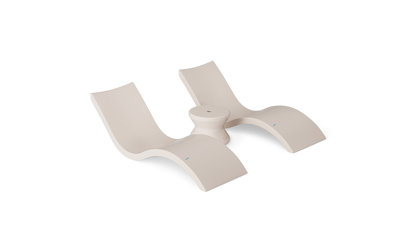 The Ledge Lounger Outdoor Oasis In-Pool Furniture Bundle includes a modern, sculptural beige lounge chair featuring two curved seats on a circular base. Its sleek design with smooth surfaces and minimalist lines is ideal for creating an artistic outdoor retreat.