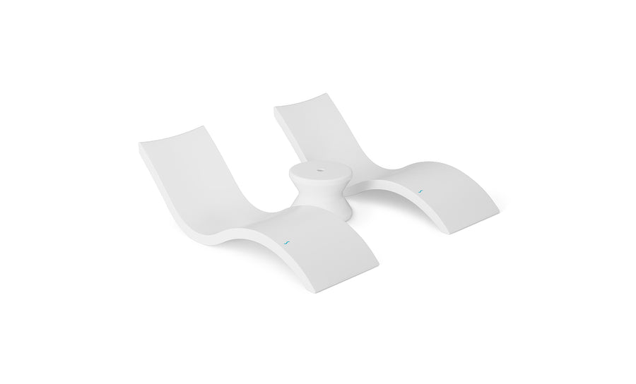 The Outdoor Oasis In-Pool Furniture Bundle by Ledge Lounger features sleek, white dual lounge chairs with a central cylindrical table, showcasing smooth curves and modern design—ideal for poolside relaxation against a minimalist white backdrop.