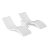 The Ledge Lounger Signature Chaise and Side Table In-Pool Set features a sleek white double lounger with smooth curves and a round center table—an ideal, modern upgrade to your poolside essentials, shown on a plain white background.