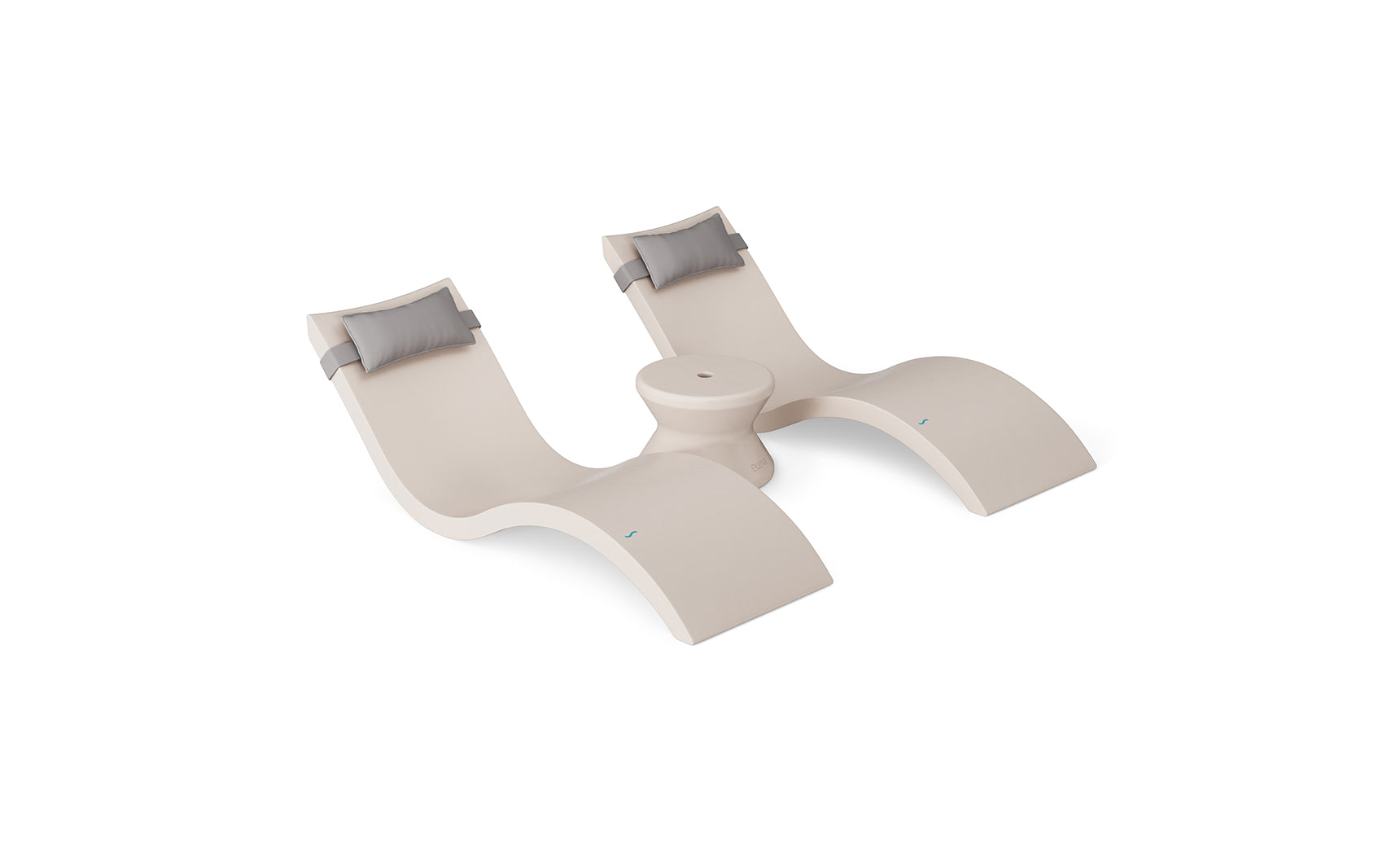 The Ledge Lounger Signature Chaise Headrest Pillow and Side Table In-Pool Set features two modern beige chaise loungers with gray headrest pillows, connected by a round center table, all styled for poolside chic against a white background.