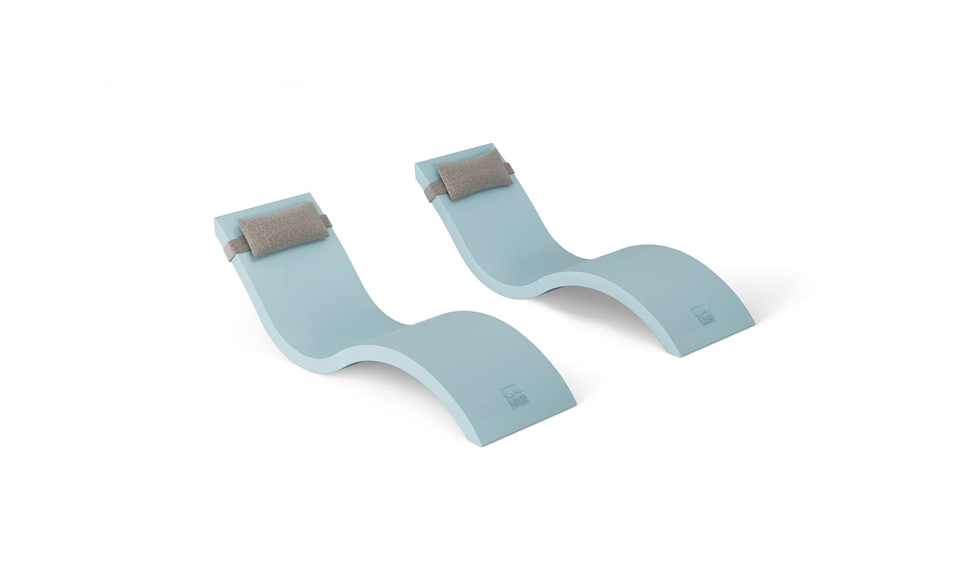 Two light blue, Ledge Lounger Outdoor Escape In-Pool Furniture cushions with gray straps are side by side against a white background. Resembling a chaise lounge, each cushion features an S-shaped contoured design for ergonomic support and comfort.