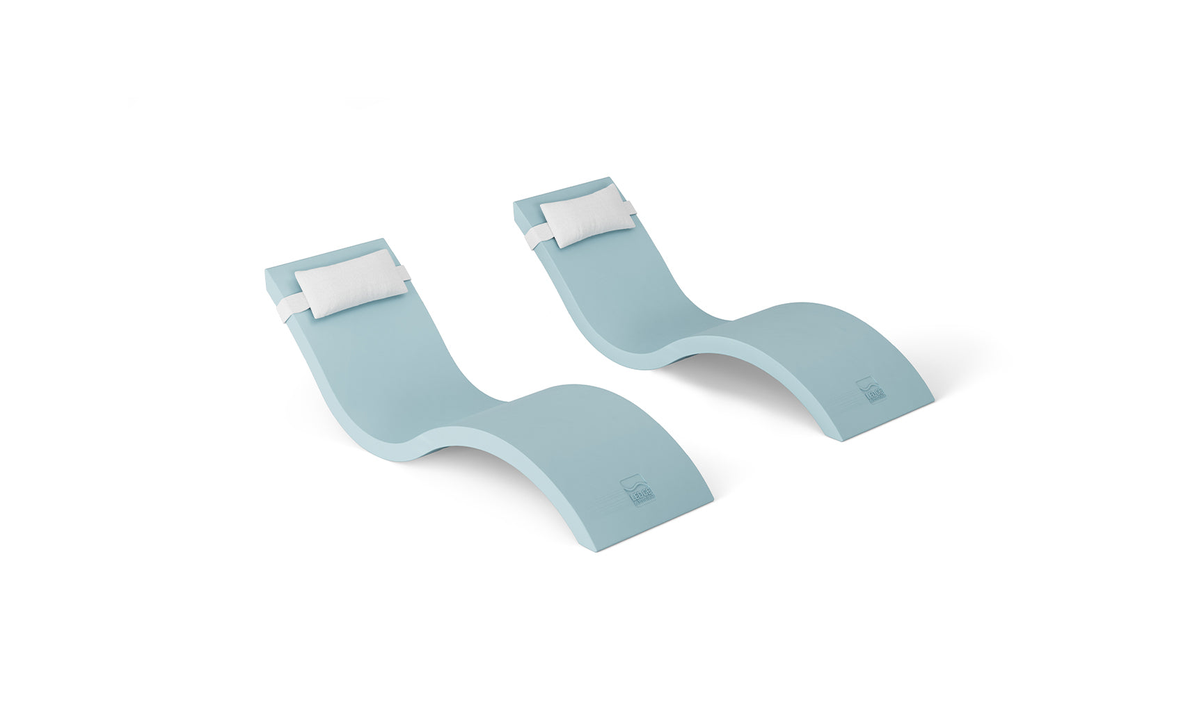 The Outdoor Escape In-Pool Furniture Bundle by Ledge Lounger features two modern, light blue chaise lounges with a wavy design, paired with white headrest pillows on a white background, offering a minimalist and stylish look perfect for any outdoor setting.