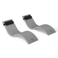 The gray, curved foam blocks with black straps from Ledge Loungers Outdoor Escape In-Pool Furniture Bundle resemble the graceful S-shape of a chaise lounge, side by side on a white backdrop and are designed to hold oars securely.