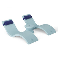 The Outdoor Paradise In-Pool Furniture Bundle by Ledge Lounger is light blue and curved, with two symmetrical raised sections and dark blue straps, resembling pool ledge furniture. It appears designed for support or exercise, featuring a round central base for stability against a plain white background.